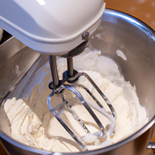 The iconic KitchenAid Artisan Series standing mixer in action, mixing dough for a batch of fresh bread.